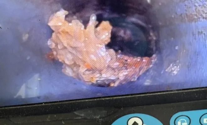 Déblocage d un bout de béton bloquer dans une canalisation eu à Villette d anthon, Vaulx-Milieu, JP ASSAINISSEMENT