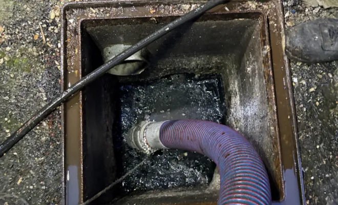 curage de réseau eu dans un centre commercial à Saint Quentin Fallavier