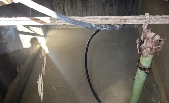 pompage nettoyage d une rétention de captage de source à Saint Marcel Bel Accueil