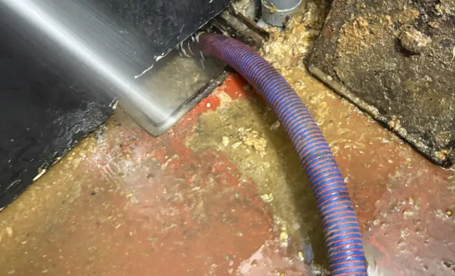 débouchage  da une canalisation wc dans une concession auto à Bourgoin Jallieu