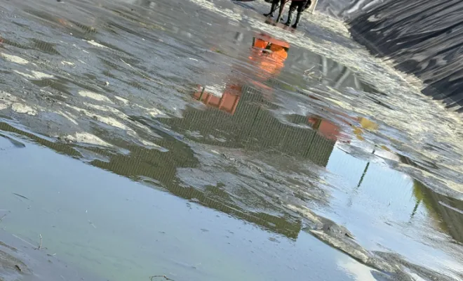 nettoyage d un bassin eaux pluviales dans une entreprise à Pont Evèque