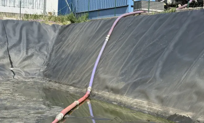 nettoyage d un bassin eaux pluviales dans une entreprise à Pont Evèque