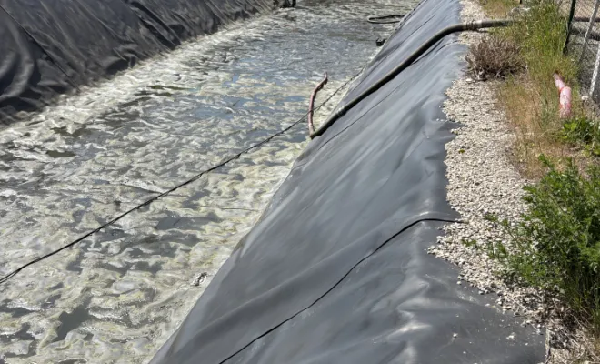 nettoyage d un bassin eaux pluviales dans une entreprise à Pont Evèque