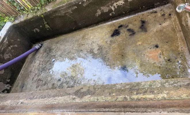 nettoyage d un lavoir avec eau stagnante à Saint Marcel Bel Acceuil