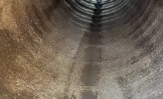 Curage d'une canalisation eaux pluvial de traversée de route pour un agriculteur à Diemoz, Vaulx-Milieu, JP ASSAINISSEMENT