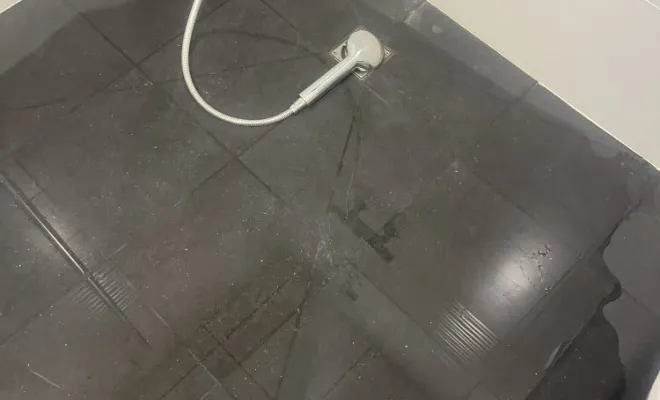 Débouchage d'un canalisation de douche dans un bâtiment bureau à l'Isle d'Abeau, Vaulx-Milieu, JP ASSAINISSEMENT