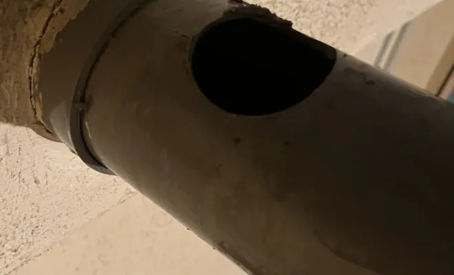 Débouchage d'une canalisation suspendue en sous-sol à Saint Laurent de Mure, Vaulx-Milieu, JP ASSAINISSEMENT