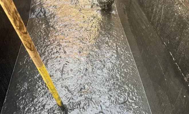Entretien d'un aire de lavage tondeuse tracteur dans un parc à Miribel, Vaulx-Milieu, JP ASSAINISSEMENT