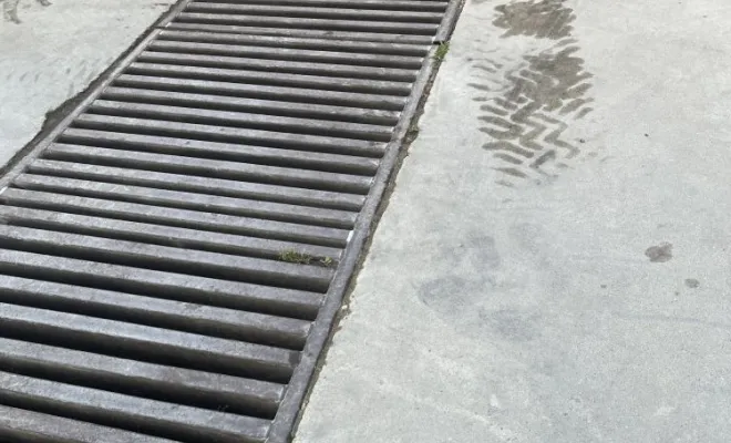 Entretien d'un aire de lavage tondeuse tracteur dans un parc à Miribel, Vaulx-Milieu, JP ASSAINISSEMENT