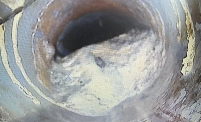 Fraisage d'une boule de ciment qui obstrue l évacuation contrôle par camera à L'Isle d'Abeau, Vaulx-Milieu, JP ASSAINISSEMENT