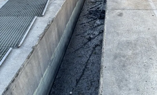 Nettoyage d'une grille aire de lavage dans une entreprise à Chaponost, Vaulx-Milieu, JP ASSAINISSEMENT