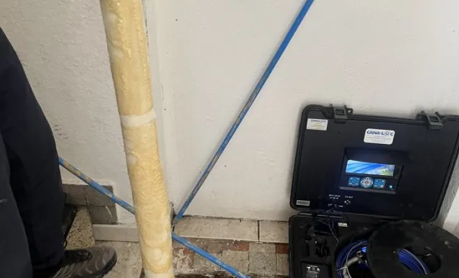 Réparation de réseau eu manchette résine dans un bâtiment pour une agence immobilière à Morestel, Vaulx-Milieu, JP ASSAINISSEMENT