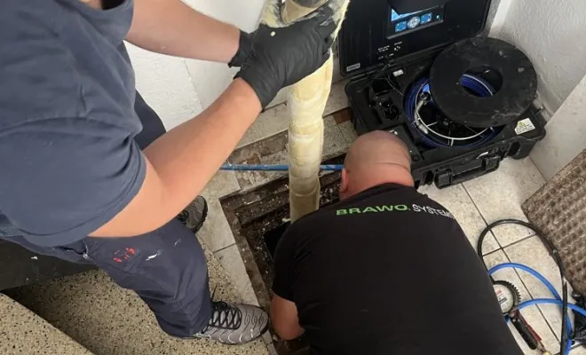 Réparation de réseau eu manchette résine dans un bâtiment pour une agence immobilière à Morestel, Vaulx-Milieu, JP ASSAINISSEMENT