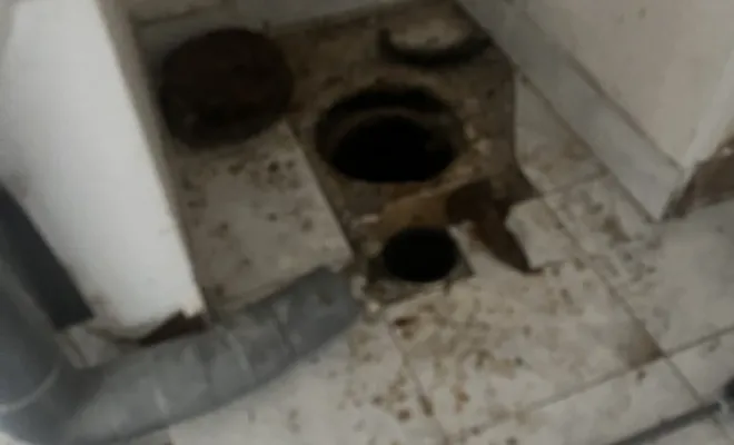 Vidange d'une ancienne fosse septique dans une cuisine à Passin, Vaulx-Milieu, JP ASSAINISSEMENT