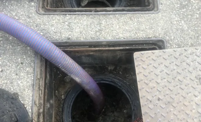 Vidange et nettoyage d'un bac à graisse de restaurant d'entreprise à Genas, Vaulx-Milieu, JP ASSAINISSEMENT