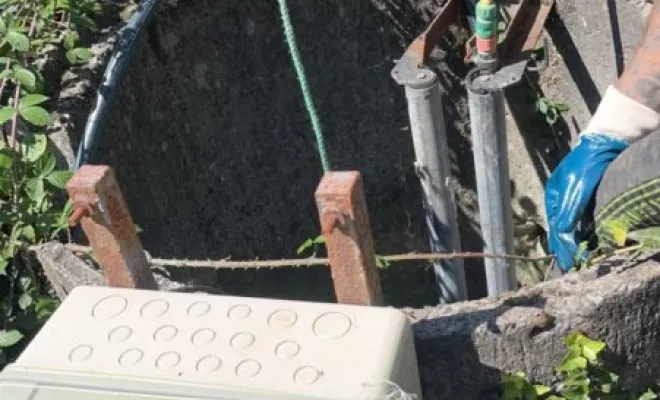 Vidange et nettoyage d'une fosse de relevage dans un camping à Vernioz, Vaulx-Milieu, JP ASSAINISSEMENT