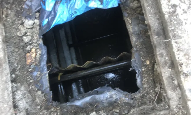 Vidange et nettoyage d'une fosse septique à Lhuis, Vaulx-Milieu, JP ASSAINISSEMENT