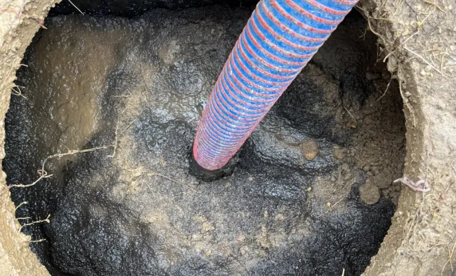 Vidange et nettoyage d'une fosse septique pour entretien à Leyrieu, Vaulx-Milieu, JP ASSAINISSEMENT