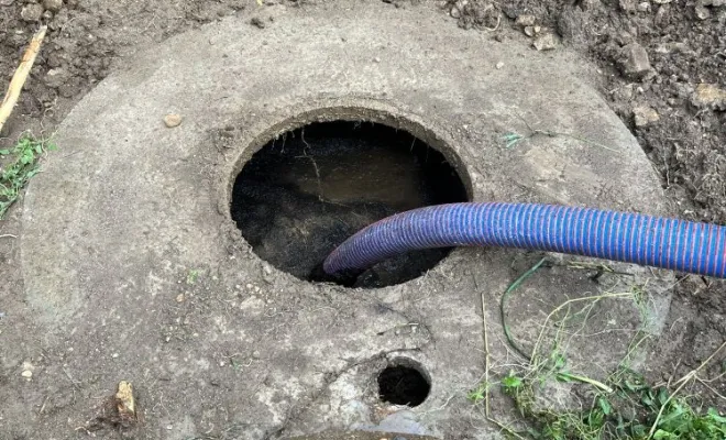 Vidange et nettoyage d'une fosse septique pour entretien à Leyrieu, Vaulx-Milieu, JP ASSAINISSEMENT
