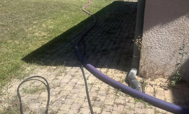 Vidange et nettoyage d'une fosse toutes eaux pour entretien à Courtenay, Vaulx-Milieu, JP ASSAINISSEMENT