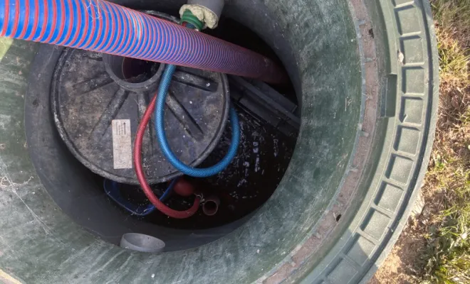 Vidange et nettoyage d'une micro station pour entretien à Les Eparres, Vaulx-Milieu, JP ASSAINISSEMENT