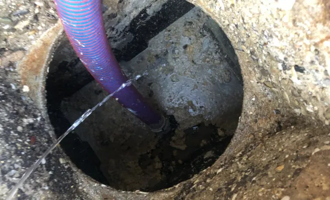 Vidange et nettoyage haute pression d'un bac à graisse chez un boucher à Saint Symphorien d'Ozon, Vaulx-Milieu, JP ASSAINISSEMENT