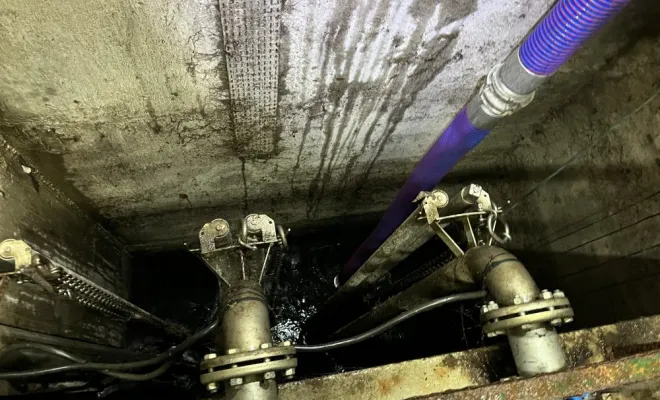 Vidange et nettoyage haute pression d 'une fosse de relevage au grand parc de Miribel Jonage, Vaulx-Milieu, JP ASSAINISSEMENT